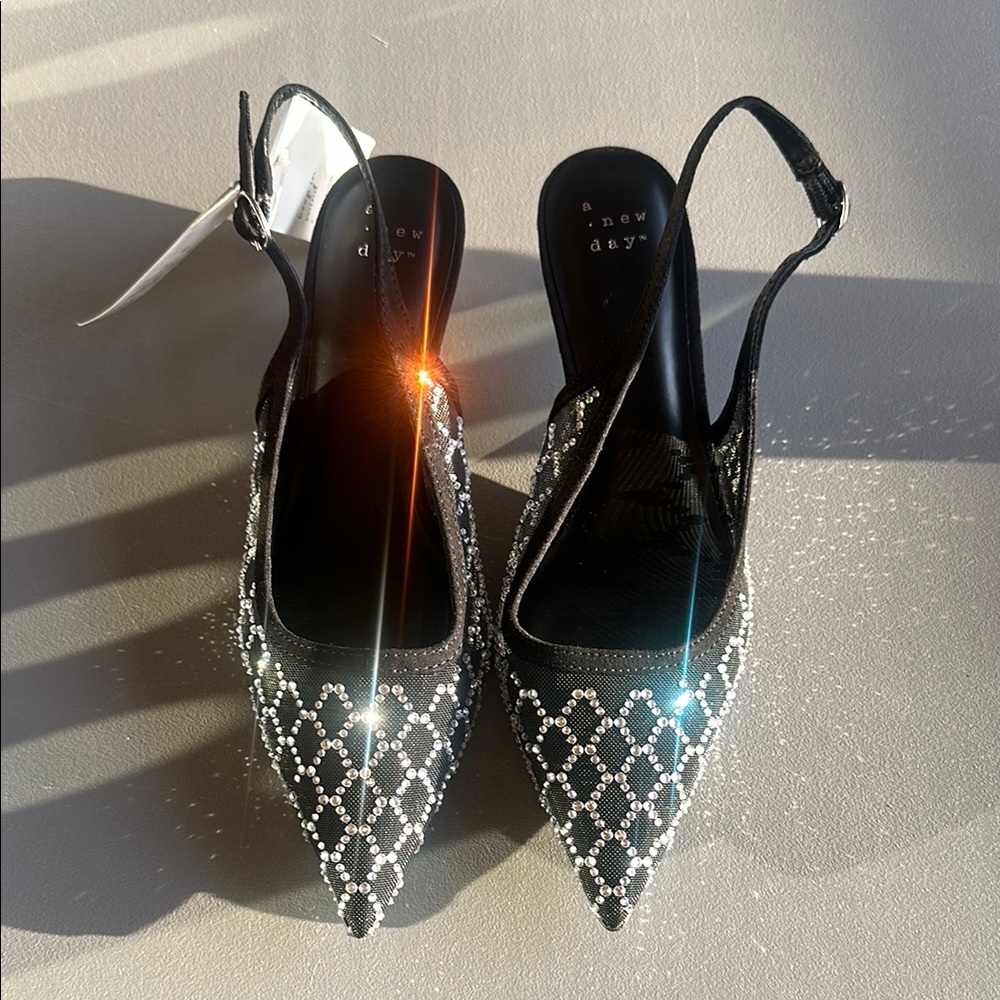 a new day Black and Silver Heels with Elegant Design